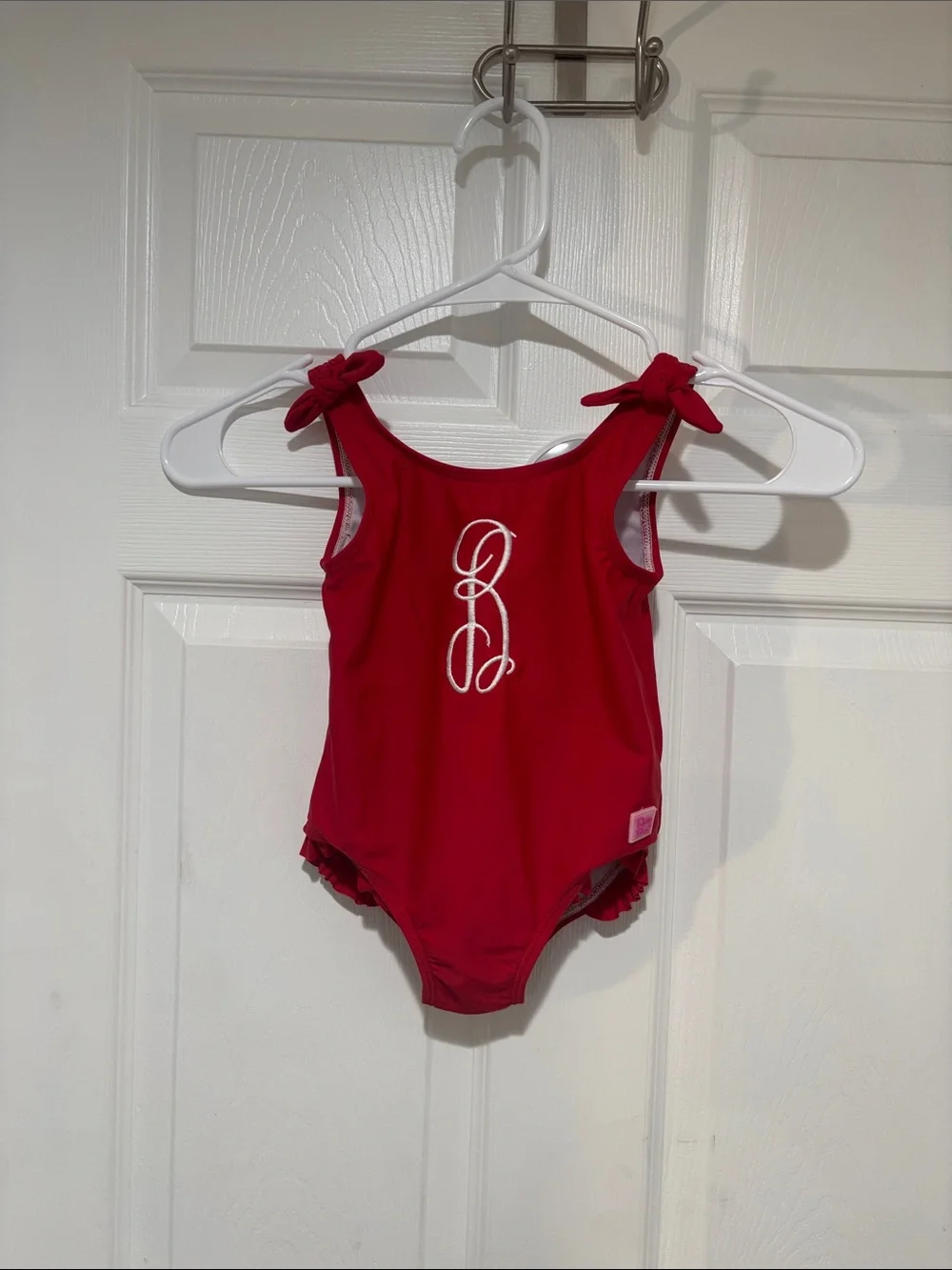 Ruffle Butts Red Girls One-Piece Swimsuit with “B” monogram